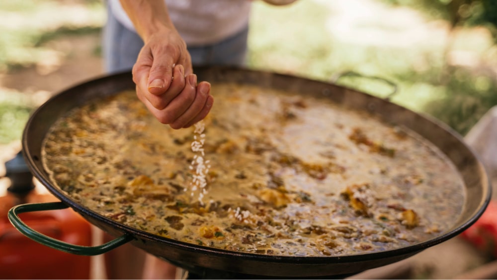 cooking a paella rice