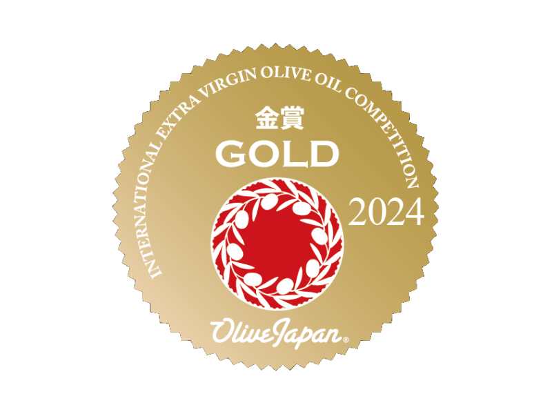 Gold medal for olive oil competition with Olive Japan branding on a green background