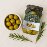 a jar of manzanilla olives with rosemary