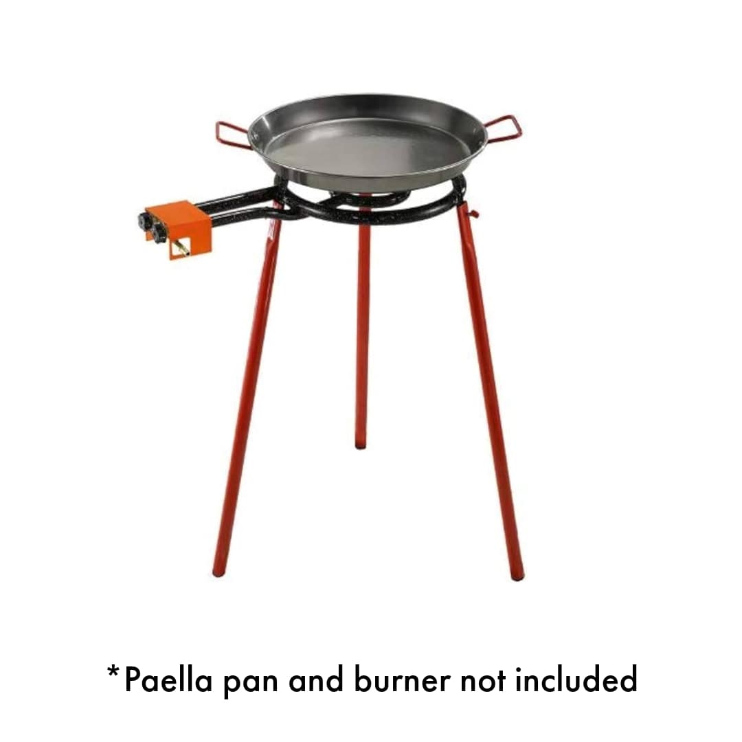 Red stand legs for a paella pan with an orange gas burner attached, against a white background. The image caption indicates that the paella pan and burner are not included.