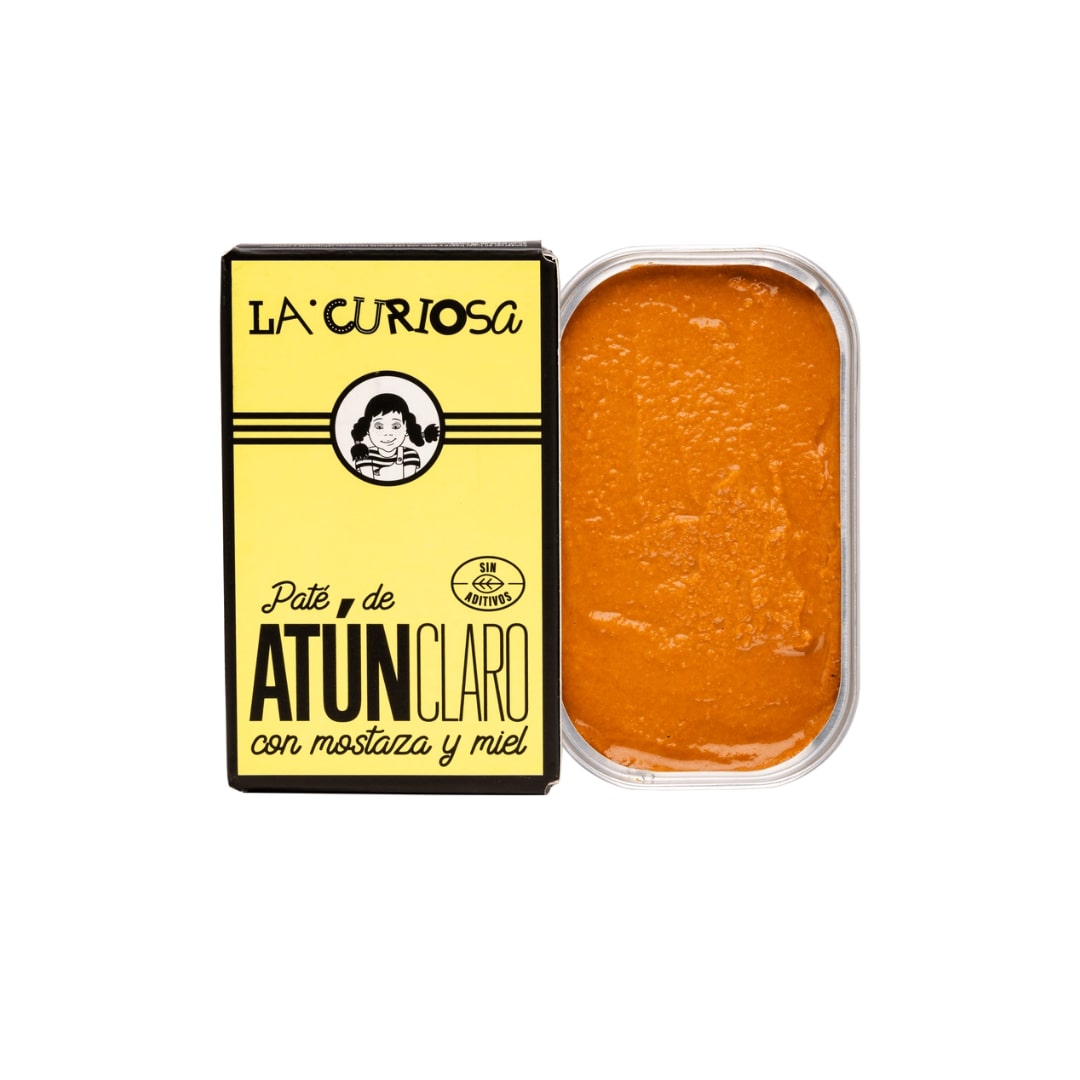 Can of tuna pate with mustard and honey from La Curiosa on a white background