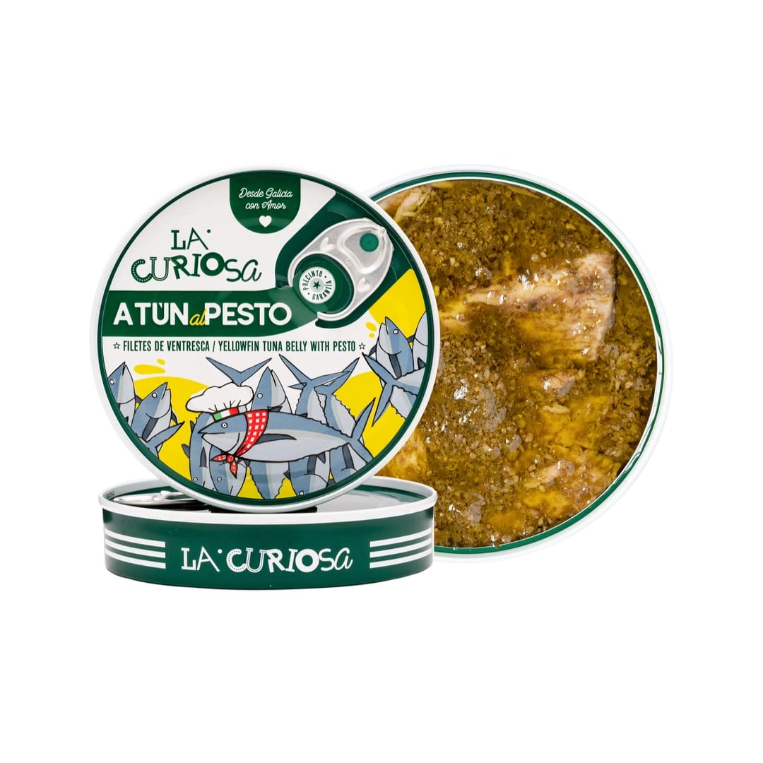 Tuna belly with pesto in a 'La Curiosa' container on a white background
