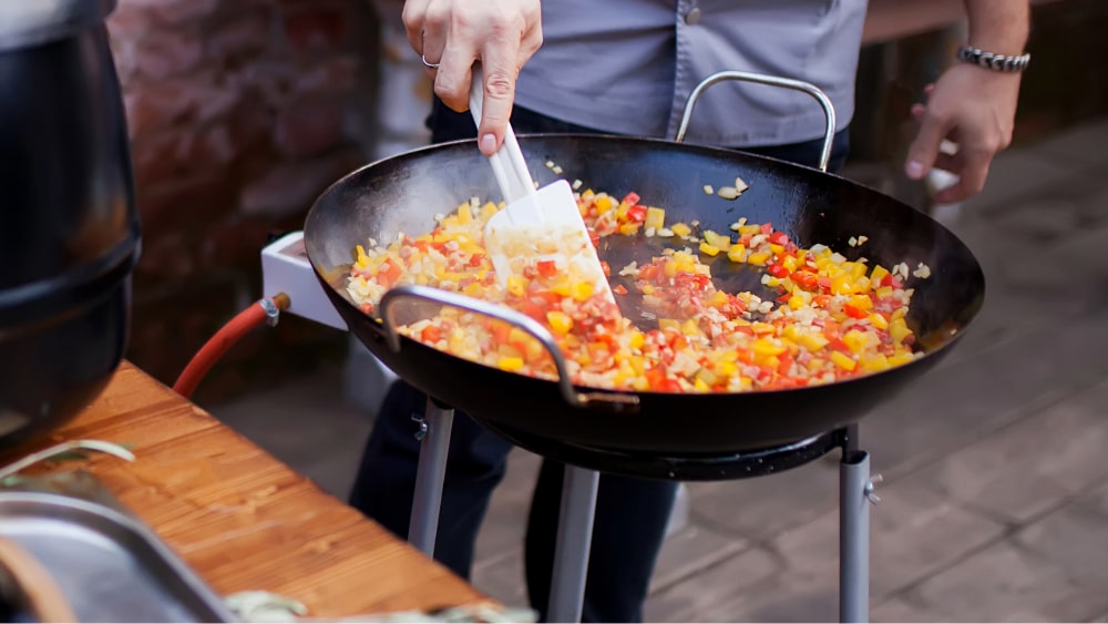 cooking paella with paella accessories