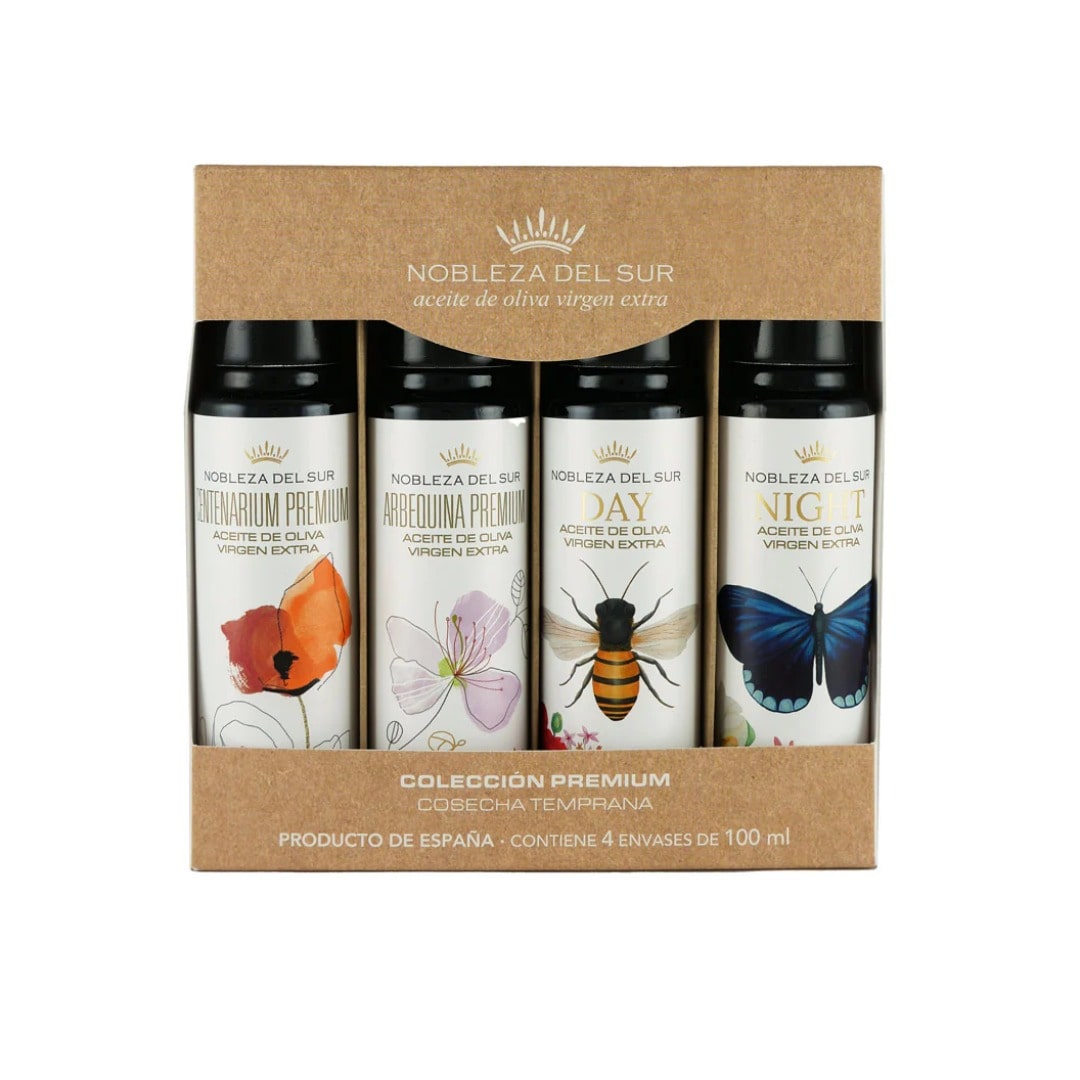 Set of four olive oil bottles in a brown box with 'Noblesza del Sur' branding.