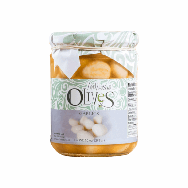 a glass jar with a label white and grey with pickled garlics inside