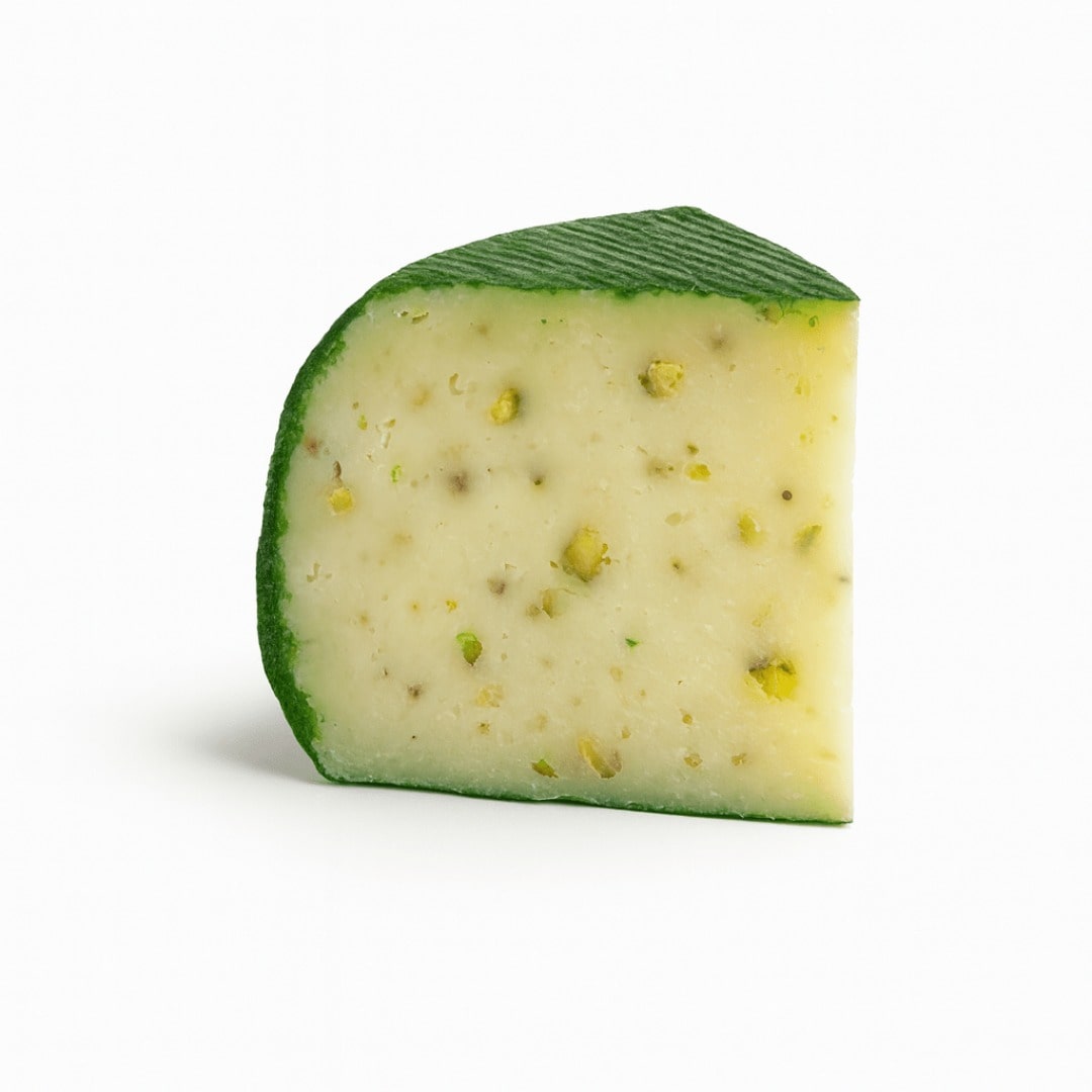 Block of cheese with green rind on a white background