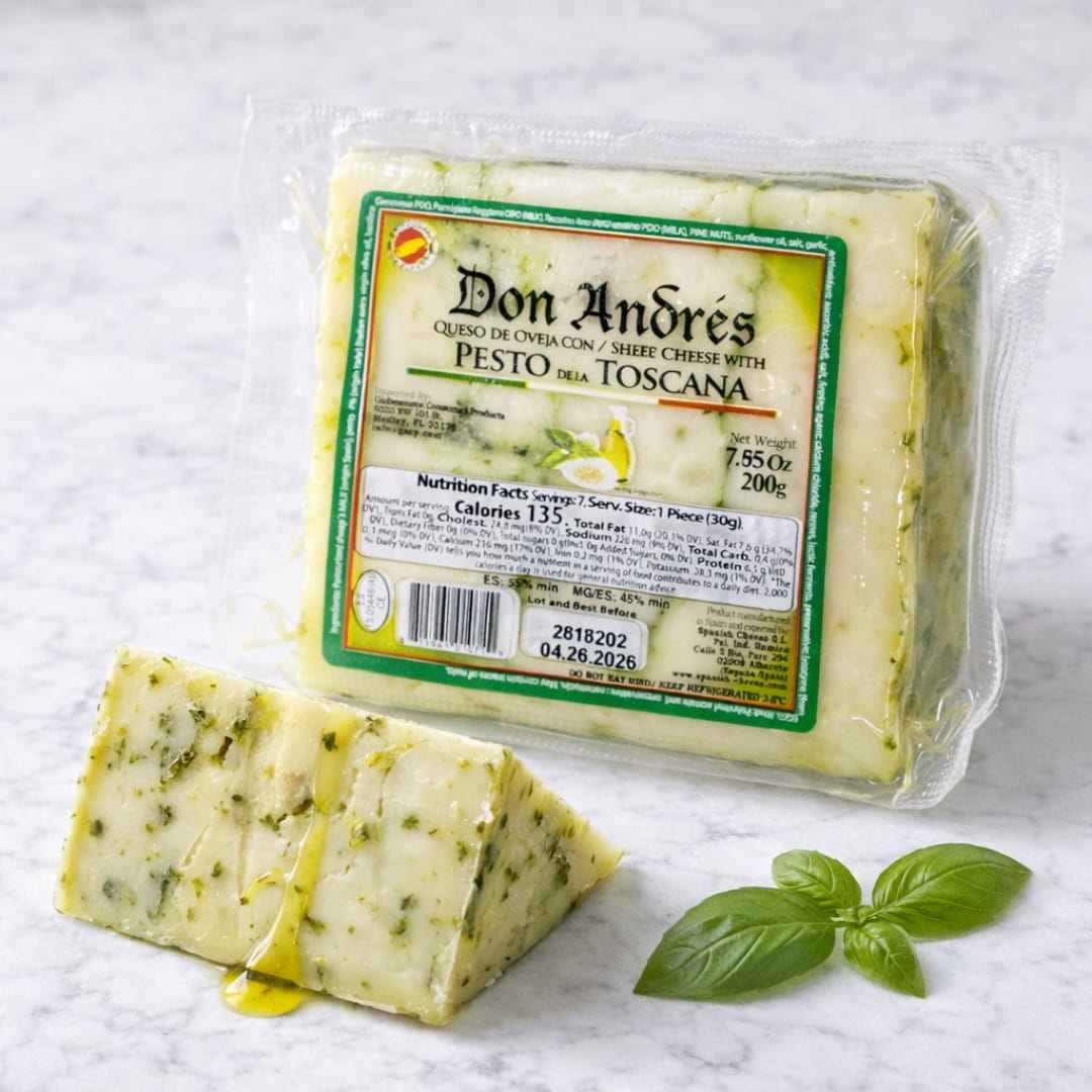 Packaged cheese with pesto flavor on a marble surface