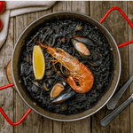 a pan with Black rice and shrimps 